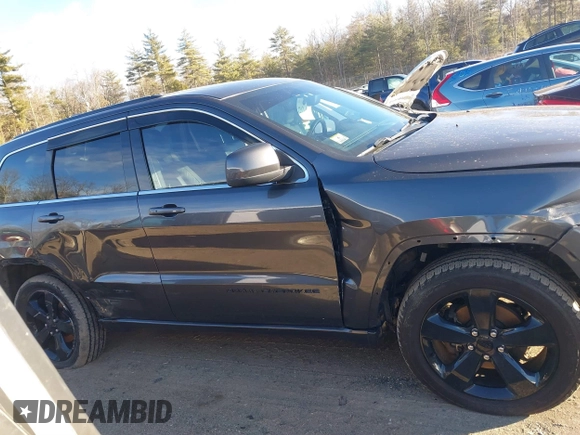2015 Jeep Grand Cherokee Laredo with VIN 1C4RJFAG8FC135253, listed as a IAAI auction lot 41169128 with 110,478 mi miles. Bid and sale history available at carsss.com. Image 14.