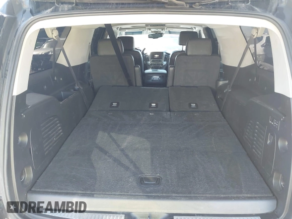 2019 Chevrolet Suburban Premier with VIN 1GNSKJKJ1KR100936, listed as a IAAI auction lot 40489121 with 97,884 mi miles and . Bid and sale history available at DreamBid. Image 18.