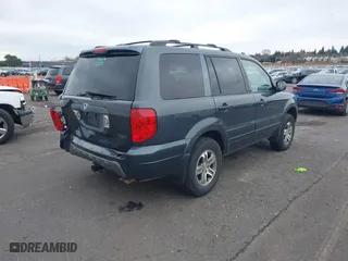 2004 Honda Pilot EX with VIN 2HKYF18444H583826, listed as a IAAI auction lot 41812601 with 196,846 mi miles. Bid and sale history available at carsss.com. Image 4.