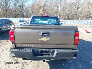 2015 Chevrolet Silverado 1500 Work Truck with VIN 1GCNCPEH7FZ233253, listed as a IAAI auction lot 41544405 with 139,708 mi miles and . Bid and sale history available at DreamBid. Image 16.