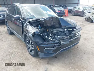2021 Volkswagen Tiguan SE with VIN 3VV3B7AX3MM157702, listed as a IAAI auction lot 41888479 with 51,807 mi miles and . Bid and sale history available at DreamBid. Image 6.