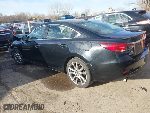 2014 Mazda 6 i Grand Touring with VIN JM1GJ1W66E1162519, listed as a IAAI auction lot 41801957 with 121,586 mi miles. Bid and sale history available at carsss.com. Image 3.