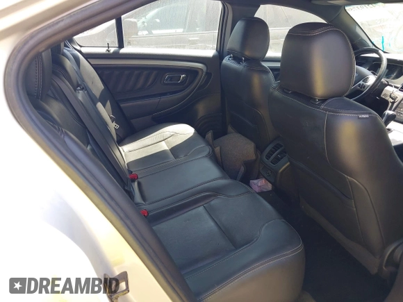 2014 Ford Taurus SEL z VIN 1FAHP2E88EG131304, wystawiony jako IAAI lot #42193759 z przebiegiem 174 465 mil mil oraz . Historia ofert i sprzedaży dostępna na DreamBid. Obrazek 8.