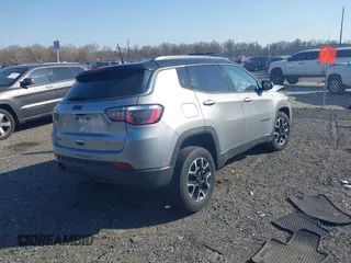 2020 Jeep Compass Trailhawk with VIN 3C4NJDDBXLT106663, listed as a IAAI auction lot 41791300 with 74,162 mi miles and . Bid and sale history available at carsss.com. Image 4.