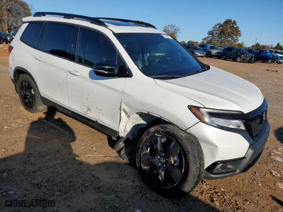 2020 Honda Passport Elite with VIN 5FNYF8H0XLB011159, listed as a Copart auction lot 81048334 with 54,484 mi miles and Salvage Title. Bid and sale history available at carsss.com. Image 4.
