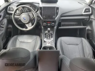 2021 Subaru Forester Touring z VIN JF2SKAXC0MH560263, wystawiony jako Copart lot #61453195 z przebiegiem Nie podano mil oraz Szkoda całkowita • Salvage title. Historia ofert i sprzedaży dostępna na DreamBid. Obrazek 8.