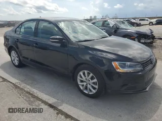 2012 Volkswagen Jetta SE with VIN 3VWDX7AJ3CM338441, listed as a Copart auction lot 60853055 with 151,075 mi miles and Salvage title. Bid and sale history available at DreamBid. Image 4.