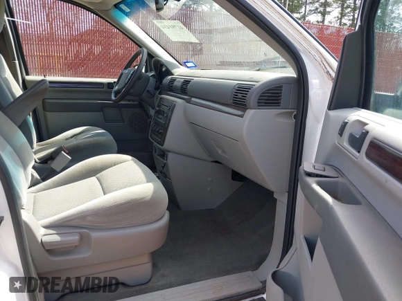 2006 Ford Freestar SEL z VIN 2FMZA52296BA23814, wystawiony jako IAAI lot #41791434 z przebiegiem 132 850 mil mil oraz . Historia ofert i sprzedaży dostępna na DreamBid. Obrazek 5.