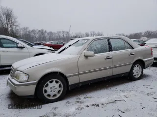 1994 Mercedes-Benz C with VIN WDBHA28E6RF015428, listed as a Copart auction lot 85866784 with Not Provided miles and Salvage Title. Bid and sale history available at carsss.com. Image 1.