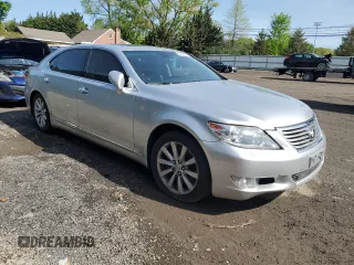 2010 Lexus LS 460 L with VIN JTHDL5EF7A5002771, listed as a Copart auction lot 54668205 with 221,878 mi miles and Salvage title. Bid and sale history available at DreamBid. Image 4.