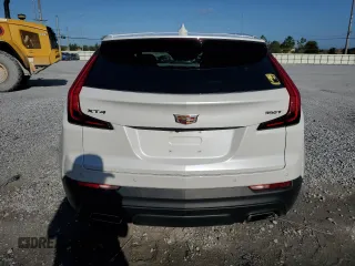 2023 Cadillac XT4 FWD Luxury with VIN 1GYAZAR42PF219114, listed as a Copart auction lot 61830125 with 23,508 mi miles and Salvage title. Bid and sale history available at DreamBid. Image 6.