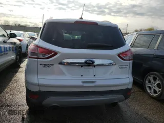 2015 Ford Escape Titanium with VIN 1FMCU0J99FUA16290, listed as a Copart auction lot 52496855 with 107,674 mi miles and Salvage Title. Bid and sale history available at DreamBid. Image 6.