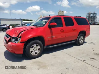2012 Chevrolet Suburban LT with VIN 1GNSCJE06CR320459, listed as a Copart auction lot 62087665 with 318,964 mi miles and Salvage title. Bid and sale history available at DreamBid. Image 1.