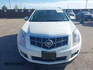 2012 Cadillac SRX Performance Collection z VIN 3GYFNEE30CS652829, wystawiony jako IAAI lot #42156961 z przebiegiem 106 473 mil mil oraz . Historia ofert i sprzedaży dostępna na DreamBid. Obrazek 12.