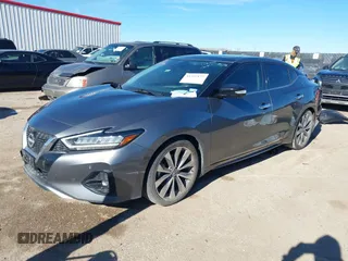 2023 Nissan Maxima Platinum with VIN 1N4AA6FV7PC502025, listed as a IAAI auction lot 41227177 with 42,524 mi miles. Bid and sale history available at carsss.com. Image 2.