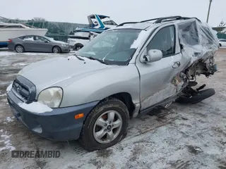 2005 Hyundai Santa Fe GLS z VIN KM8SC73D35U912897, wystawiony jako IAAI lot #41401372 z przebiegiem 260 843 mil mil oraz . Historia ofert i sprzedaży dostępna na DreamBid. Obrazek 2.