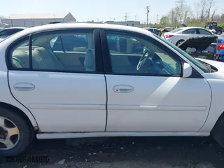 2003 Chevrolet Malibu LS with VIN 1G1NE52J13M538299, listed as a IAAI auction lot 42051511 with 213,853 mi miles. Bid and sale history available at carsss.com. Image 13.