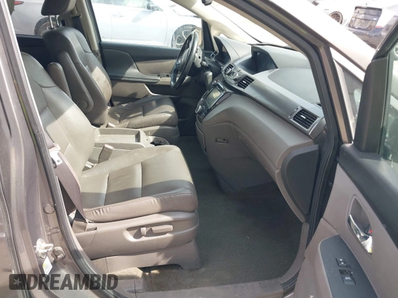2014 Honda Odyssey EX-L with VIN 5FNRL5H67EB106183, listed as a IAAI auction lot 42210600 with 196,166 mi miles and . Bid and sale history available at DreamBid. Image 5.