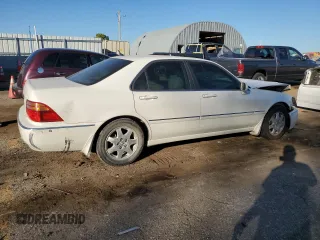 2002 Acura RL with VIN JH4KA96542C003755, listed as a Copart auction lot 77580384 with 153,548 mi miles and Salvage Title. Bid and sale history available at carsss.com. Image 3.