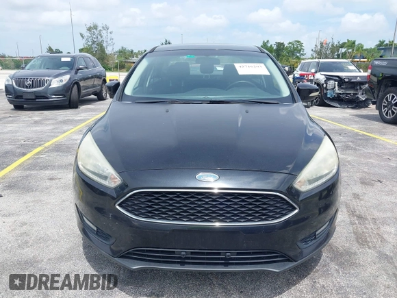 2015 Ford Focus SE with VIN 1FADP3F21FL209221, listed as a IAAI auction lot 42716293 with 100,465 mi miles and . Bid and sale history available at DreamBid. Image 6.