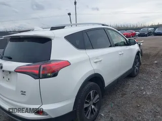 2018 Toyota RAV4 XLE with VIN JTMRFREV8JJ225065, listed as a IAAI auction lot 41940678 with 145,074 mi miles. Bid and sale history available at carsss.com. Image 4.