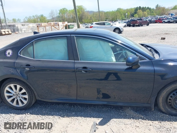 2019 Toyota Camry LE z VIN 4T1B11HK7KU269928, wystawiony jako IAAI lot #42048750 z przebiegiem 102 585 mil mil oraz . Historia ofert i sprzedaży dostępna na DreamBid. Obrazek 13.