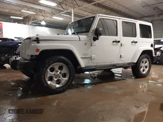 2014 Jeep Wrangler Unlimited Sahara with VIN 1C4BJWEG1EL326605, listed as a IAAI auction lot 41325037 with 135,824 mi miles. Bid and sale history available at carsss.com. Image 14.