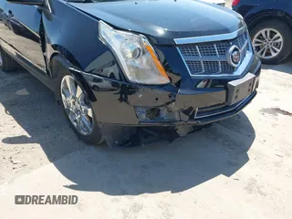 2011 Cadillac SRX Premium Collection z VIN 3GYFNCEY5BS597566, wystawiony jako IAAI lot #41983784 z przebiegiem 102 989 mil mil oraz . Historia ofert i sprzedaży dostępna na DreamBid. Obrazek 6.