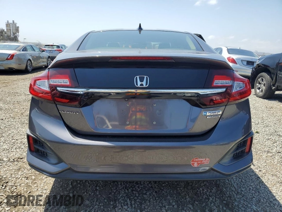 2018 Honda Clarity Touring z VIN JHMZC5F36JC014495, wystawiony jako Copart lot #56139675 z przebiegiem 75 020 mil mil oraz Szkoda całkowita • Salvage title. Historia ofert i sprzedaży dostępna na DreamBid. Obrazek 6.