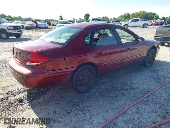 2007 Ford Taurus SE z VIN 1FAFP53U97A216487, wystawiony jako IAAI lot #42322956 z przebiegiem 169 743 mil mil oraz . Historia ofert i sprzedaży dostępna na DreamBid. Obrazek 4.