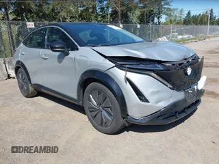 2023 Nissan ARIYA Engage z VIN JN1AF0BA2PM407039, wystawiony jako IAAI lot #42053069 z przebiegiem 25 663 mil mil oraz . Historia ofert i sprzedaży dostępna na DreamBid. Obrazek 1.