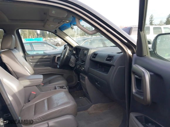 2011 Honda Ridgeline RTL with VIN 5FPYK1F5XBB454788, listed as a IAAI auction lot 41501881 with 171,481 mi miles. Bid and sale history available at carsss.com. Image 5.