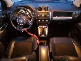 2014 Jeep Compass Latitude with VIN 1C4NJCEB0ED708098, listed as a Copart auction lot 81561334 with 105,687 mi miles and Salvage Title. Bid and sale history available at carsss.com. Image 8.