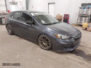 2017 Subaru Impreza with VIN 4S3GTAA65H3747893, listed as a IAAI auction lot 41012279 with 86,279 mi miles. Bid and sale history available at carsss.com. Image 1.
