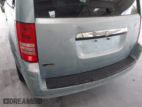 2009 Chrysler Town & Country Touring with VIN 2A8HR54119R584798, listed as a IAAI auction lot 42183484 with 174,871 mi miles and . Bid and sale history available at DreamBid. Image 6.