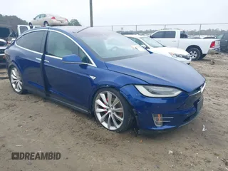 2016 Tesla Model X P90D with VIN 5YJXCBE46GFS00714, listed as a IAAI auction lot 40734674 with 83,194 mi miles. Bid and sale history available at carsss.com. Image 1.