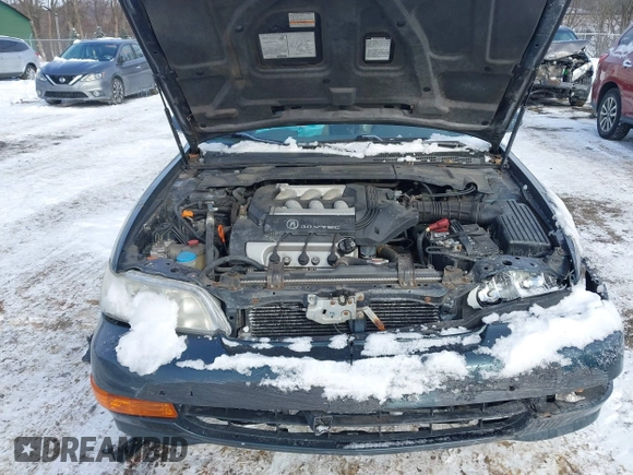 1999 Acura CL Premium z VIN 19UYA2250XL006640, wystawiony jako IAAI lot #41393749 z przebiegiem 77 308 mil mil oraz . Historia ofert i sprzedaży dostępna na DreamBid. Obrazek 10.