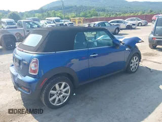 2013 MINI Convertible S with VIN WMWZP3C5XDT705613, listed as a IAAI auction lot 42392748 with 87,477 mi miles and . Bid and sale history available at DreamBid. Image 4.