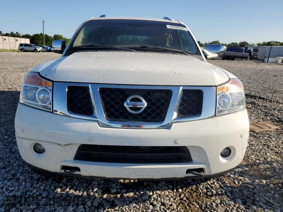 2011 Nissan Armada Platinum z VIN 5N1AA0NC2BN620032, wystawiony jako Copart lot #52098665 z przebiegiem Nie podano mil oraz Szkoda całkowita • Salvage title. Historia ofert i sprzedaży dostępna na DreamBid. Obrazek 5.