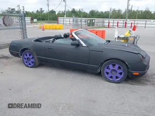 2002 Ford Thunderbird w/Hardtop Premium with VIN 1FAHP60A32Y105748, listed as a IAAI auction lot 41964399 with 1 mi miles. Bid and sale history available at carsss.com. Image 12.