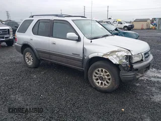 2000 Honda Passport z VIN 4S6DM58W6Y4406996, wystawiony jako IAAI lot #41597280 z przebiegiem 226 764 mil mil oraz . Historia ofert i sprzedaży dostępna na DreamBid. Obrazek 1.
