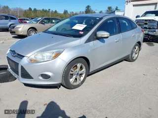 2013 Ford Focus SE with VIN 1FADP3F2XDL282164, listed as a IAAI auction lot 41990821 with 175,768 mi miles. Bid and sale history available at carsss.com. Image 2.