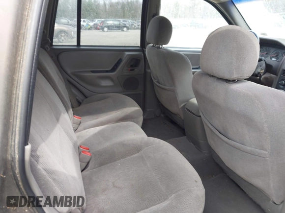 2001 Jeep Grand Cherokee Laredo with VIN 1J4GW48SX1C658610, listed as a IAAI auction lot 41831013 with 200,142 mi miles and . Bid and sale history available at DreamBid. Image 8.