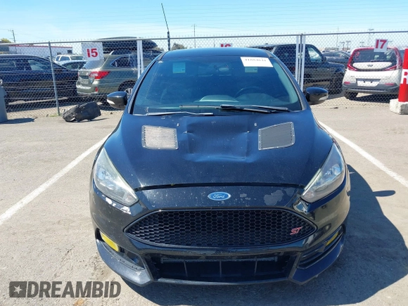 2017 Ford Focus ST with VIN 1FADP3L91HL223141, listed as a IAAI auction lot 41884641 with 129,476 mi miles and . Bid and sale history available at carsss.com. Image 12.