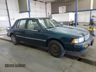 1994 Plymouth Acclaim z VIN 3P3AA46K7RT276936, wystawiony jako Copart lot #49509835 z przebiegiem 176 324 mil mil oraz Tytuł czysty. Historia ofert i sprzedaży dostępna na DreamBid. Obrazek 4.