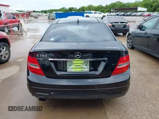 2015 Mercedes-Benz C-Class C 250 with VIN WDDGJ4HBXFG383850, listed as a IAAI auction lot 41809724 with 100,032 mi miles. Bid and sale history available at carsss.com. Image 16.