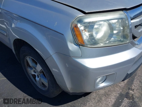 2011 Honda Pilot EX-L with VIN 5FNYF3H6XBB055684, listed as a IAAI auction lot 41820076 with 227,655 mi miles and . Bid and sale history available at DreamBid. Image 6.