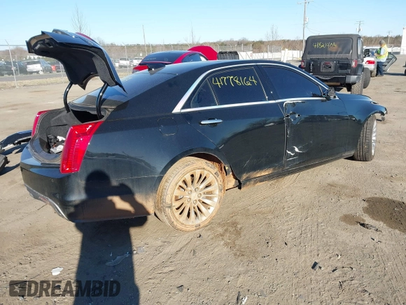 2019 Cadillac CTS Luxury AWD z VIN 1G6AX5SX8K0129858, wystawiony jako IAAI lot #41778164 z przebiegiem 89 695 mil mil oraz . Historia ofert i sprzedaży dostępna na DreamBid. Obrazek 4.