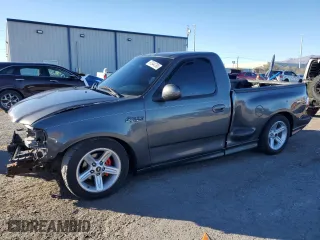 2003 Ford F-150 Lightning with VIN 2FTRF07313CA43362, listed as a Copart auction lot 87544765 with 98,589 mi miles and Salvage Title. Bid and sale history available at carsss.com. Image 1.