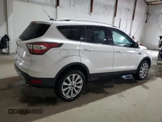 2017 Ford Escape Titanium with VIN 1FMCU0J96HUB31397, listed as a Copart auction lot 50970835 with 127,598 mi miles and Salvage Title. Bid and sale history available at carsss.com. Image 3.